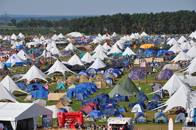 lifestyle camping scene with tent setup and outdoor cooking station in Ireland scenic environment
